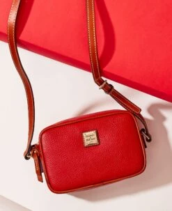 Pebble Grain Camera Crossbody Caramel -Dooney & Bourke R1318 ILD lifestyle 1